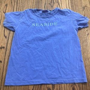 A  royal blue Seaside shirt.